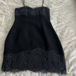 Beautiful little black dress with flattering lace detail!